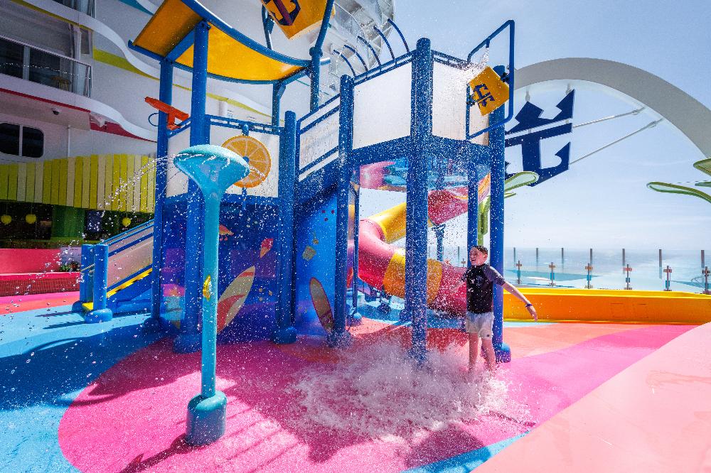Child running through fountains at the Splashaway Bay kids' water park