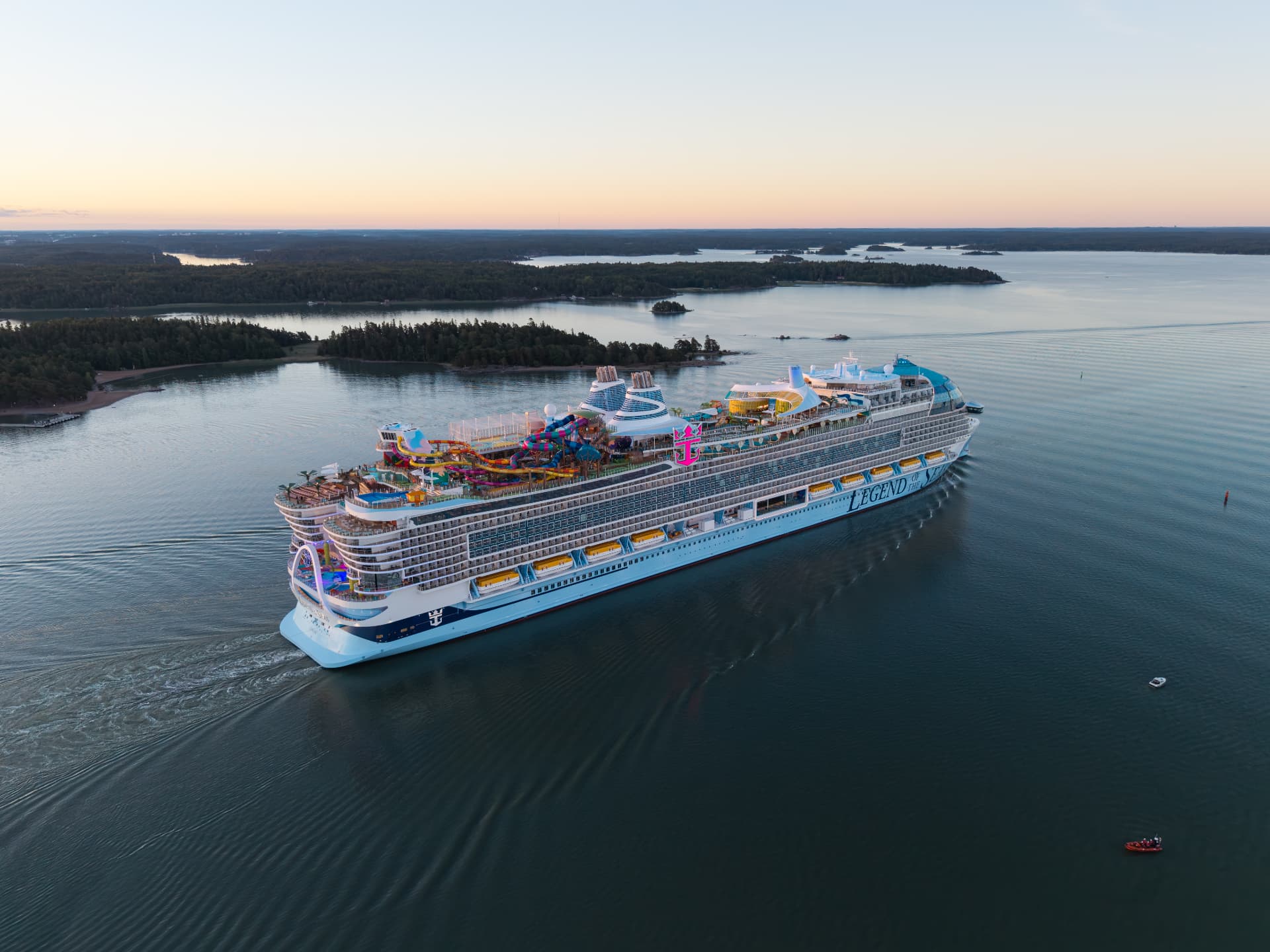 Aerial view of Legend of the Seas cruising the Finnish archipelago at dawn